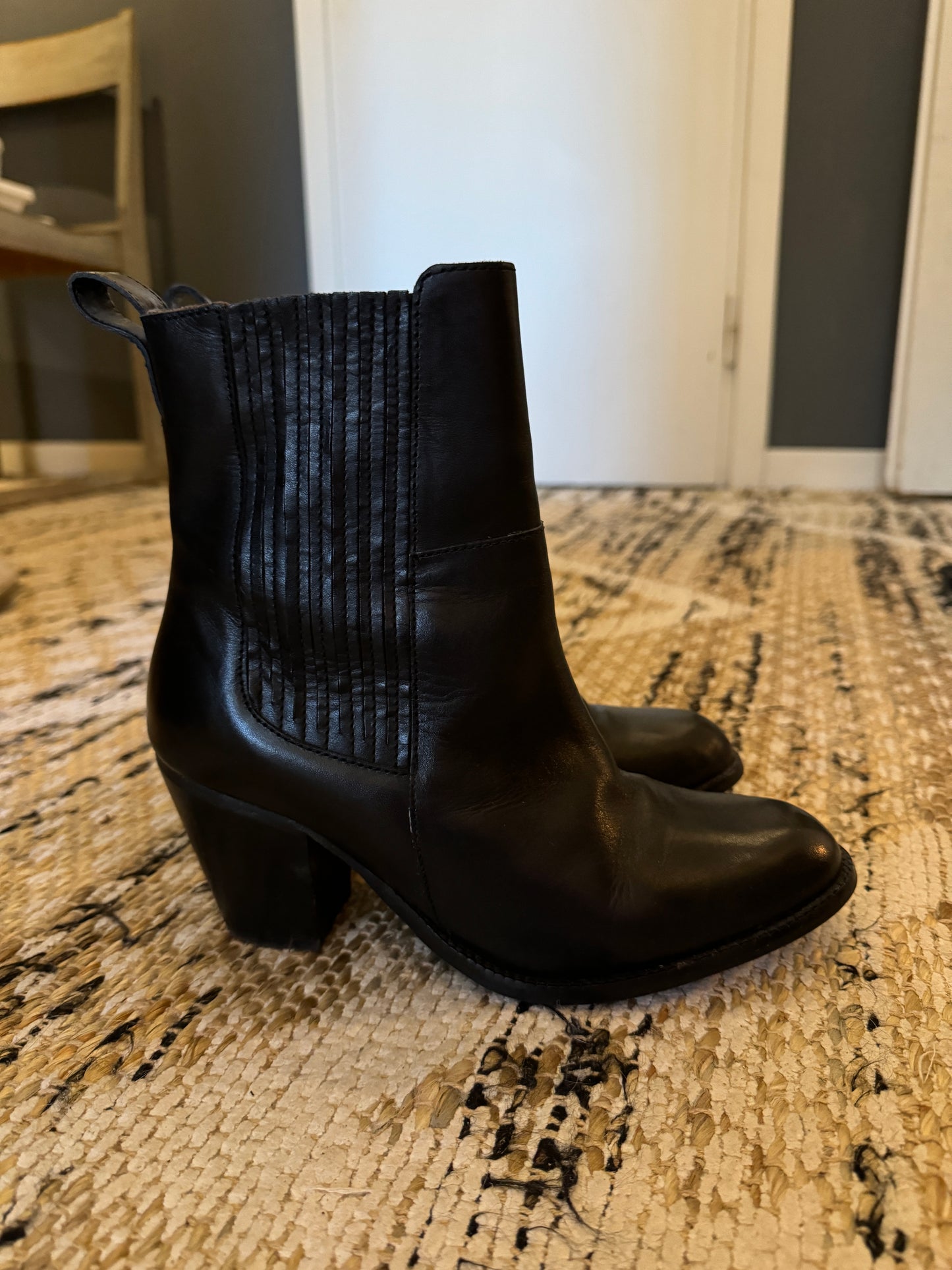 Black boots with cowboy heel