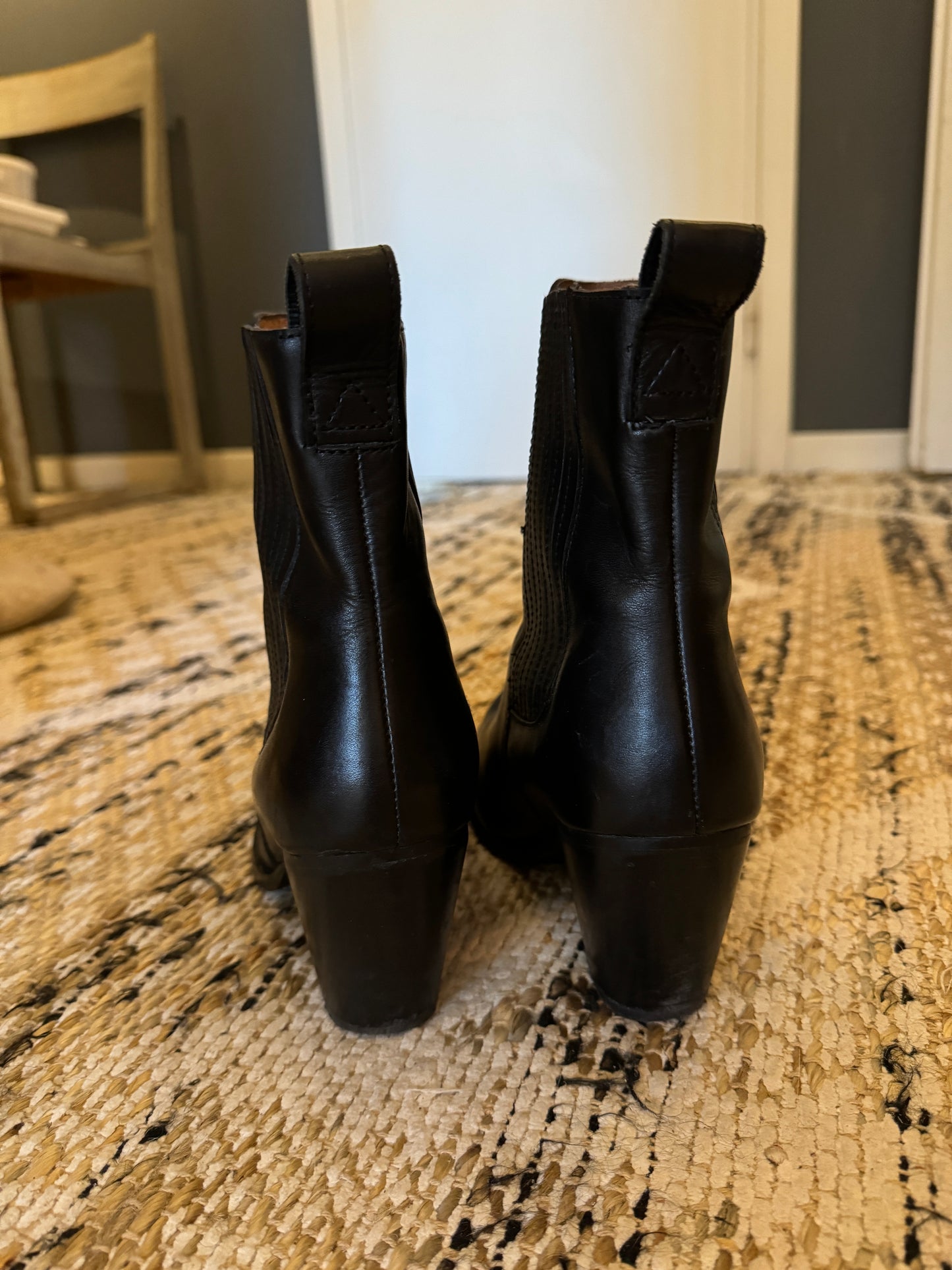 Black boots with cowboy heel