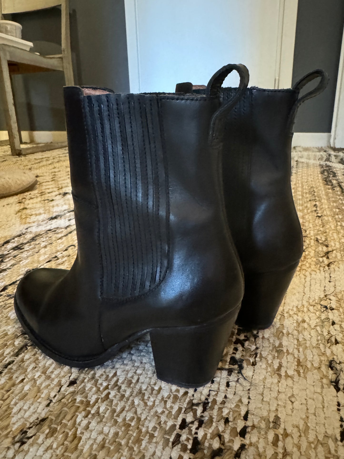 Black boots with cowboy heel