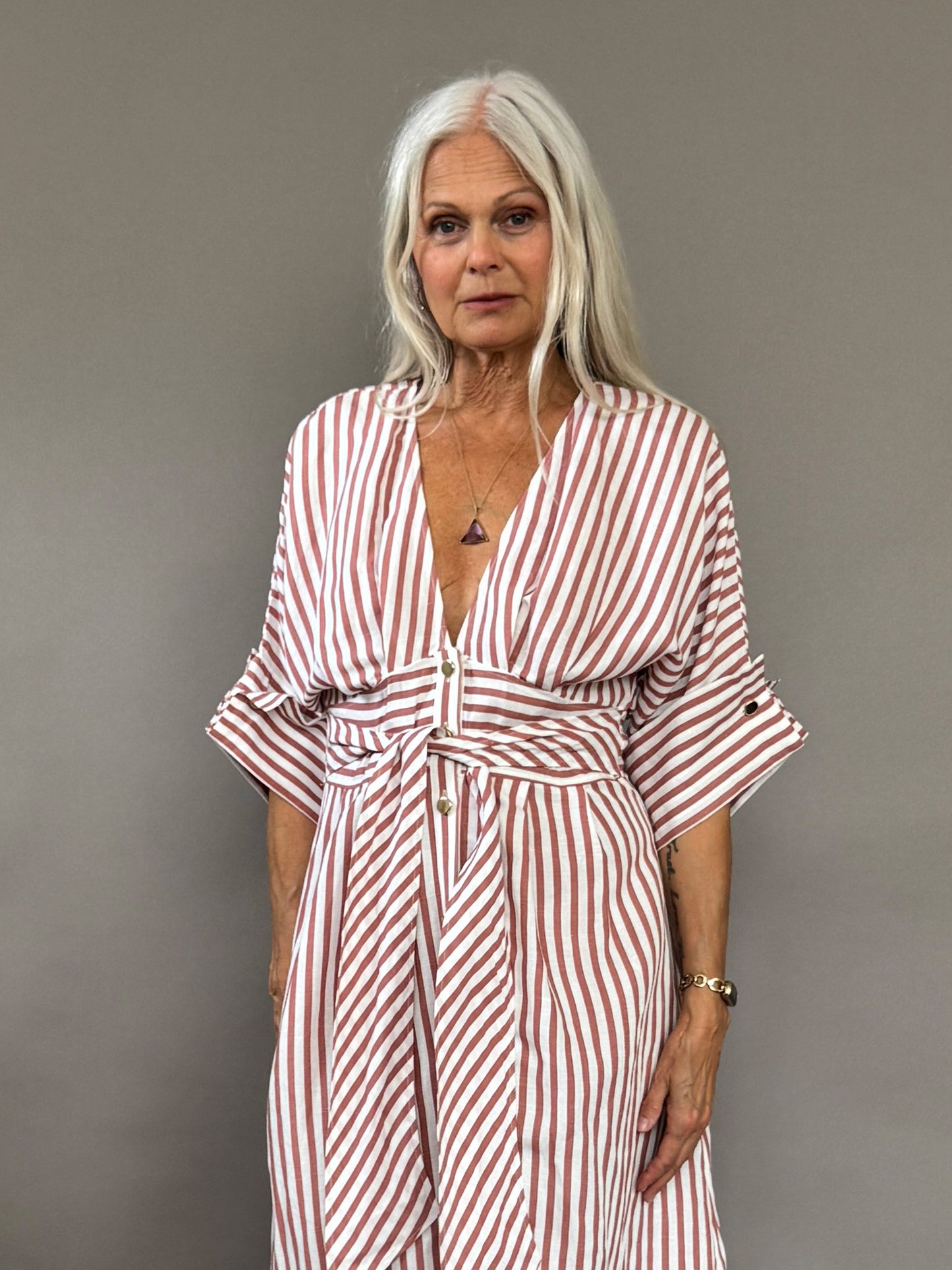 Striped dress with golden buttons