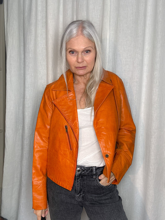 Orange biker jacket in leather